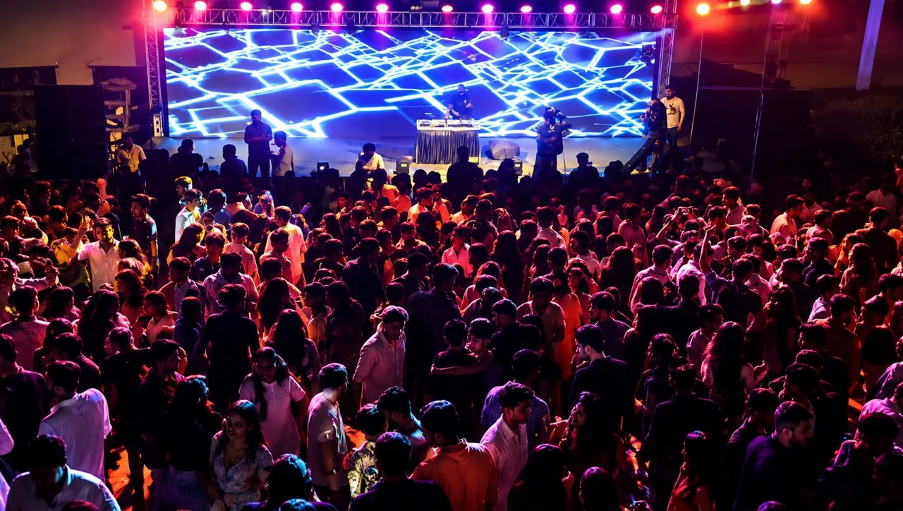 Festival crowd under neon lights
